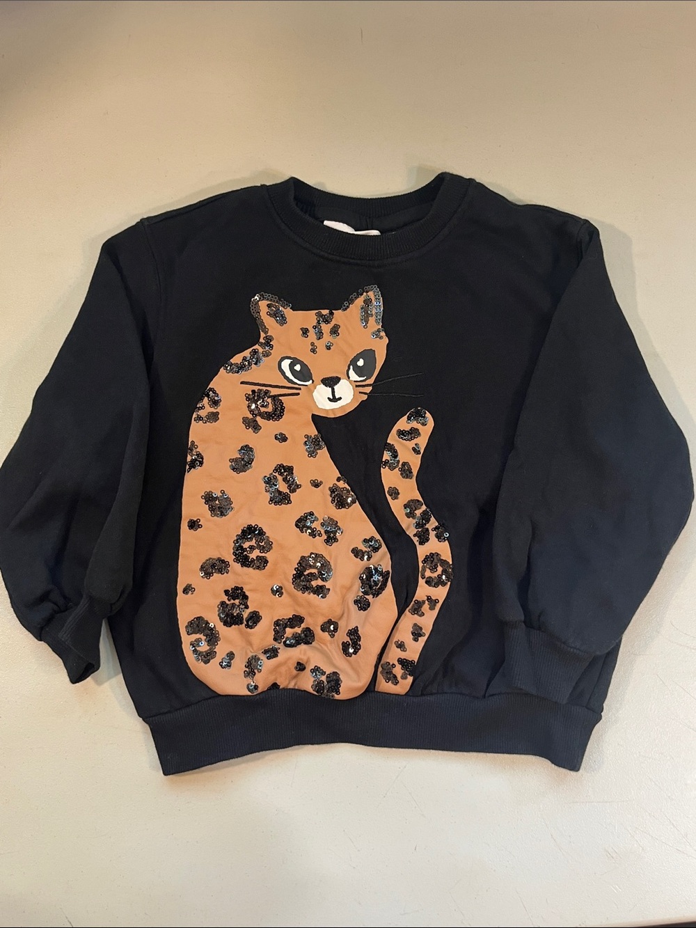 H&M Black Sweatshirt with Tan Sequin Leopard